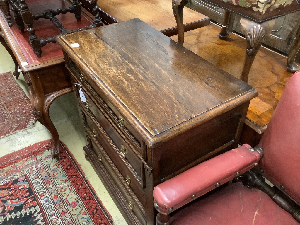 A 17th century style oak chest of four drawers, width 91cm, depth 48cm, height 91cm